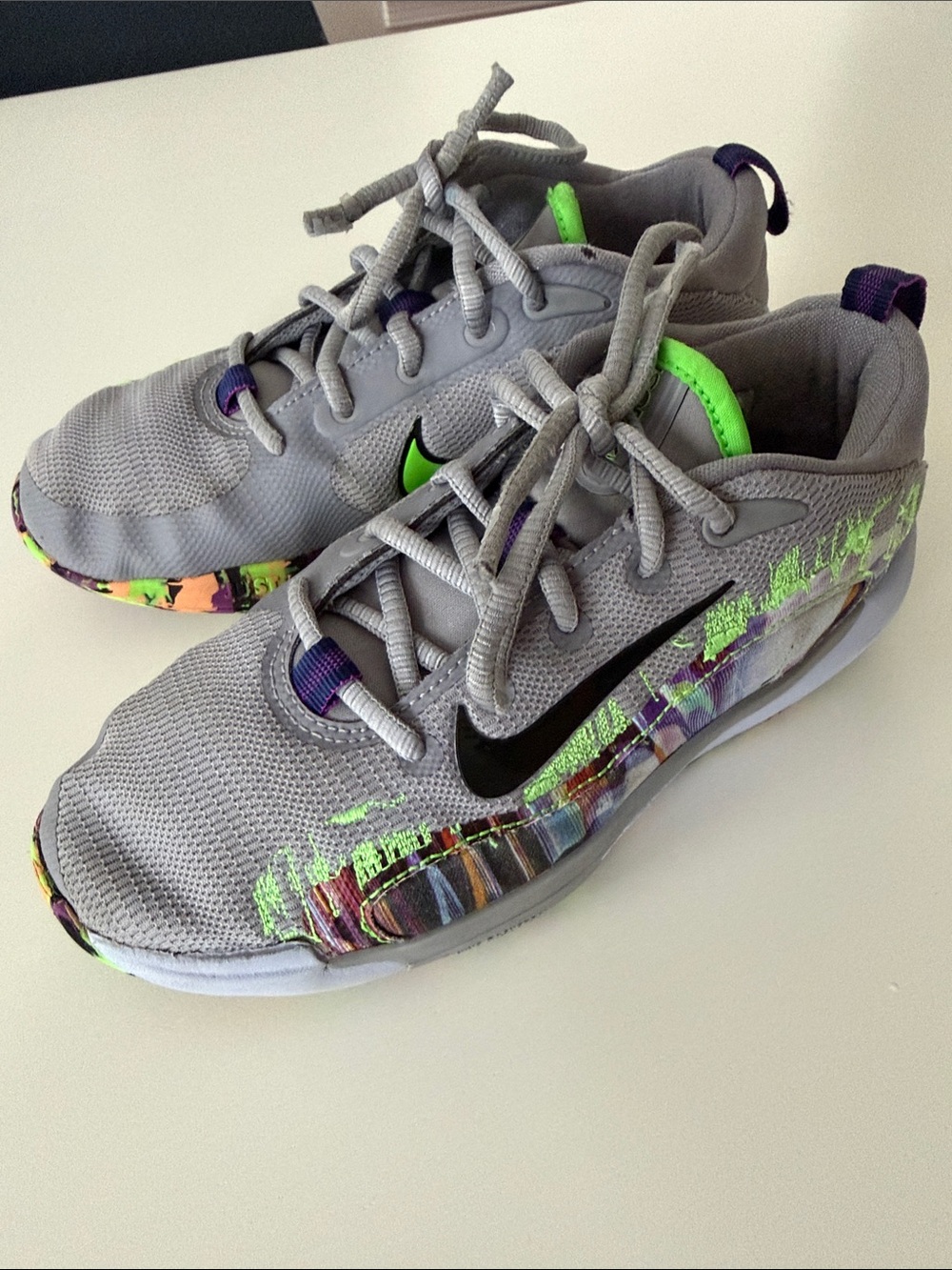 Nike Kids Gray Sneakers with Neon Green and Purple Accents